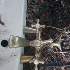 White Corner Bath with Traditional Brass Taps