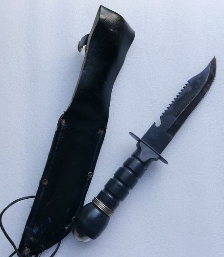 Vintage 1980s Survival Knife with compass and a storage compartment in the knife handle