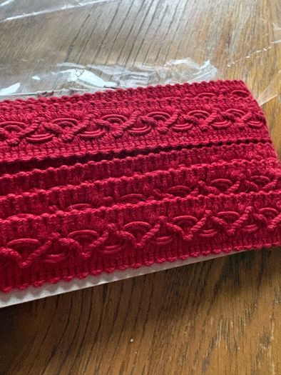 New 5.75 metres of red half in thick upholstery gimp