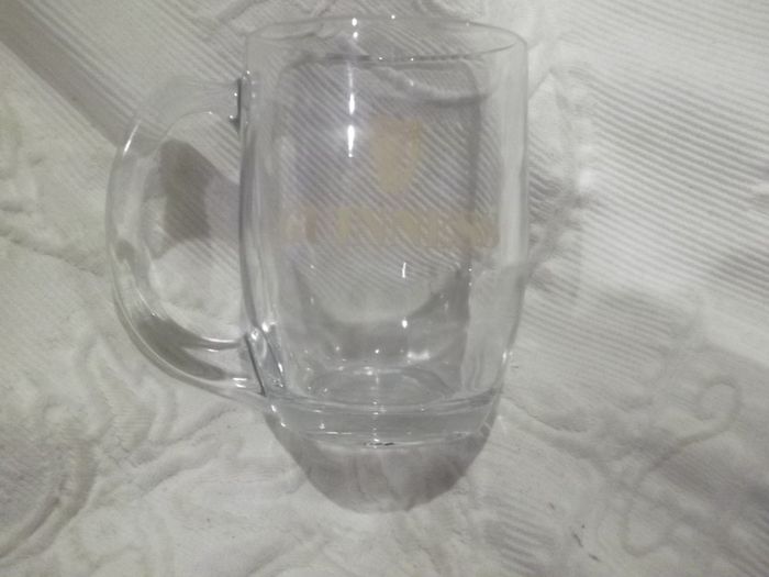 a vintage half point guinness glass made by waterford glass