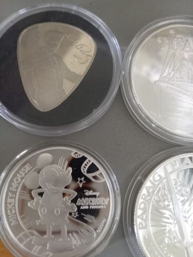 Mickey Mouse, Elvis, 2 titanic, paidraig Pearse, Micheal collins coins