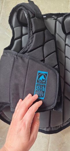 childs horse riding helmet and body protector