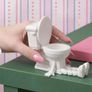 Mini Toilet Figurine With Movable Limbs Image 2