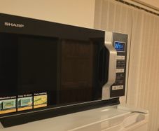 Sharp 23L 900W Solo Flatbed Microwave
