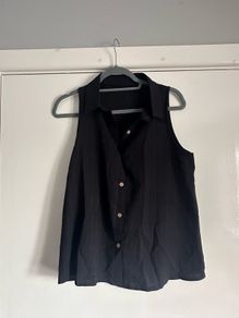 Black sleeveless shirt