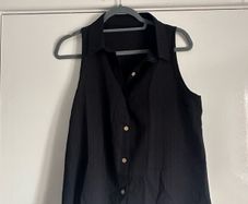 Black sleeveless shirt