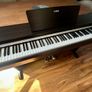 Yamaha Arius YDP-142 Digital Piano with rosewood finish and matching stool Image 4