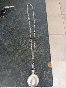 silver chain and locket