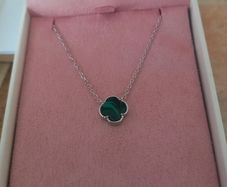 silver necklace with green stone