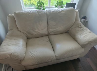 Two leather two-seater sofas for sale