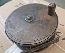 Antique brass fishing reel