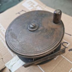 Antique brass fishing reel