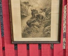 Pair of Western prints with buffalo framed pictures