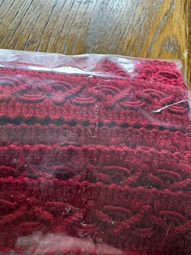 New 5.75 metres of red half in thick upholstery gimp