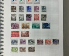 Collections. Starter collection with used stamps in Blue 22-ring binder with countries from Anguilla to Japan. Includes 56 images.