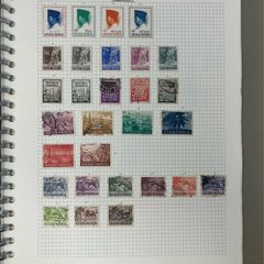 Collections. Starter collection with used stamps in Blue 22-ring binder with countries from Anguilla to Japan. Includes 56 images.