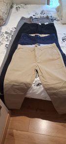 Selection of men's branded chinos