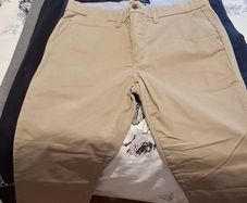 Selection of men's branded chinos