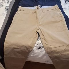 Selection of men's branded chinos