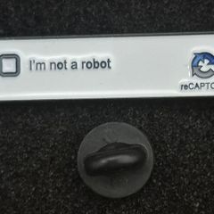 I'm not a robot. pin back badge.