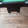 Pool table with cues and balls Image 3
