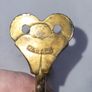 Patient brass coat hangers Image 3