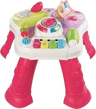Girls toy activity table and ball tower.