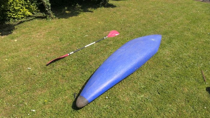Canoe with Paddle