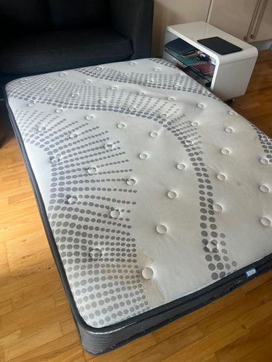 Mattress double supreme comfort with a small coffee stain