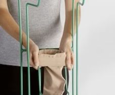 Compression socks aid