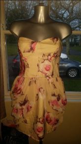 Rare floral sleeveless peplum stunning dress size UK12 EU40 Postage included