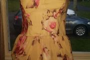 Rare floral sleeveless peplum stunning dress size UK12 EU40 Postage included