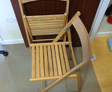Wooden fold away two designer chairs