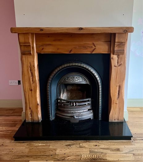 Cast Iron and timber fireplace