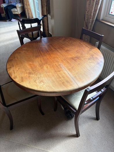Antique dining table and 6 chairs.