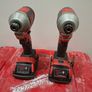2 Milwaukee impact drivers with batteries Image 2