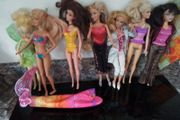 Seven Part Dressed Barbie Dolls