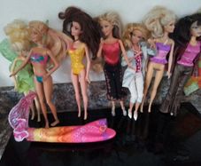 Seven Part Dressed Barbie Dolls