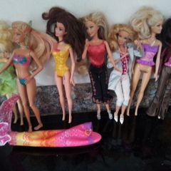 Seven Part Dressed Barbie Dolls