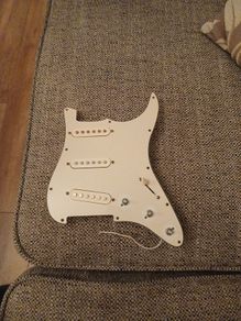 guitar pickguard. Loaded 3 single coil pups.