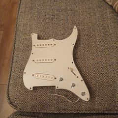 guitar pickguard. Loaded 3 single coil pups.