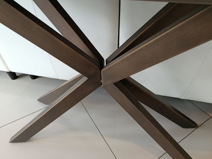 Coffee table from Eazy Living, brown glass top