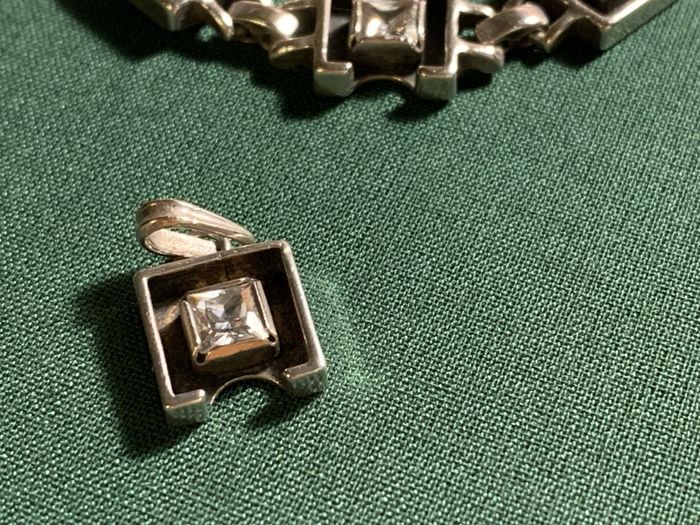 Silver set of bracelet ,earrings and pendant