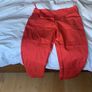 Dunnes red trousers Image 4