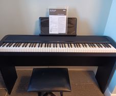 Korg electric piano . Comes with original piano stool..