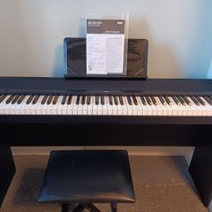 Korg electric piano . Comes with original piano stool..