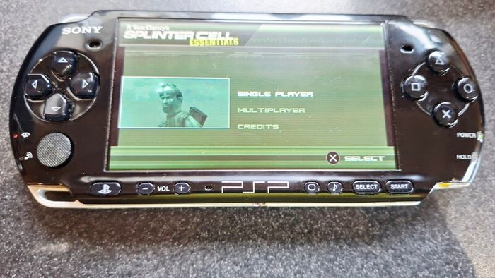 Modded Black PSP Slim 3000 128GB with games