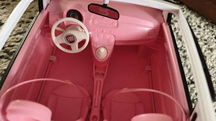 Barbie with car.