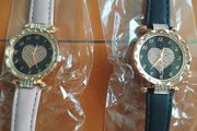 2 womens watches with leather straps
