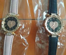 2 womens watches with leather straps
